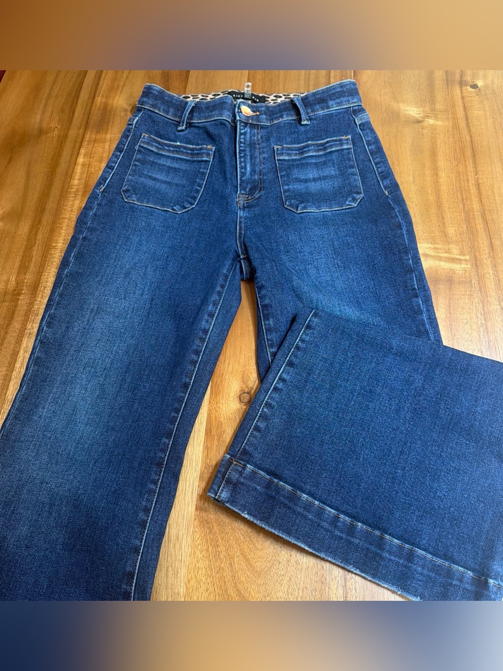 RISEN HIGH-RISE PATCHED POCKET FRONT FLARE JEANS Med Wash size 9 Stretch